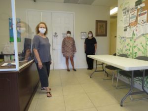 Program REACH staff tends to the needs of clients during COVID-19 pandemic.